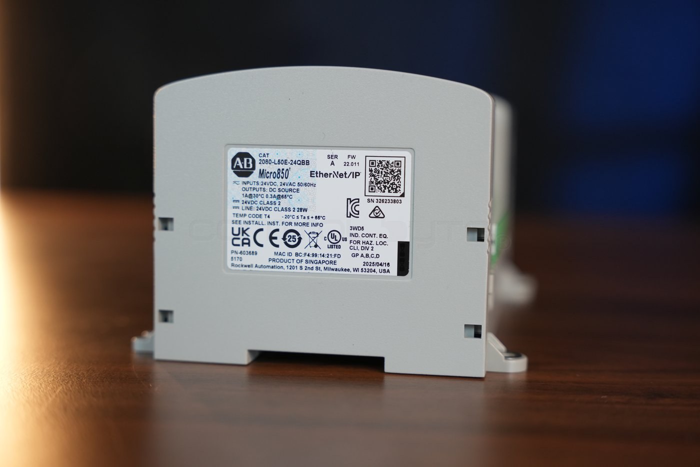 Micro850 2080-L50E-24QBB controller nameplate on the back of the housing