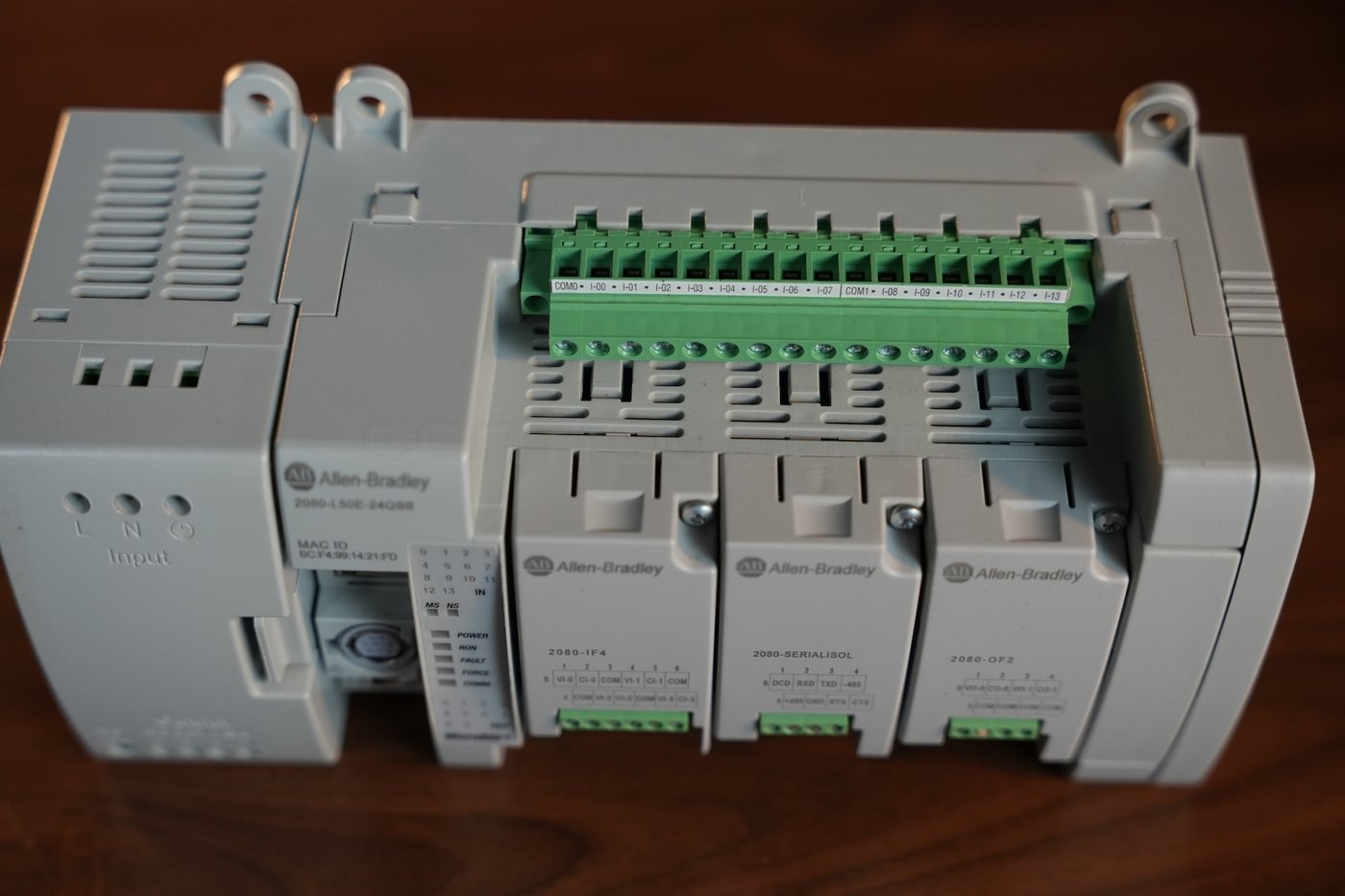 Removed digital input terminal block labeled COM0, I-00 to I-13